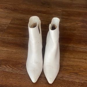 Heeled white booties